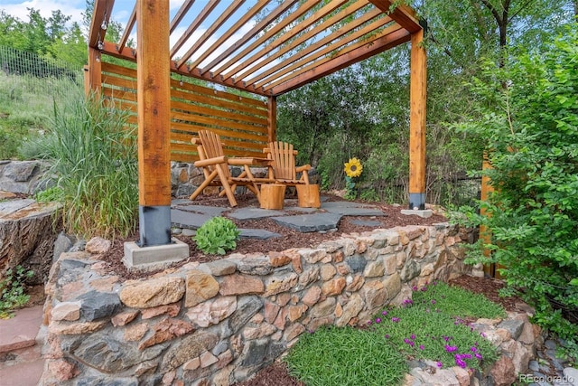 2874 SE Grapevine Rd, Idledale, CO 80453 - view of patio with a pergola