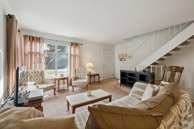 living area with stairway and light colored carpet