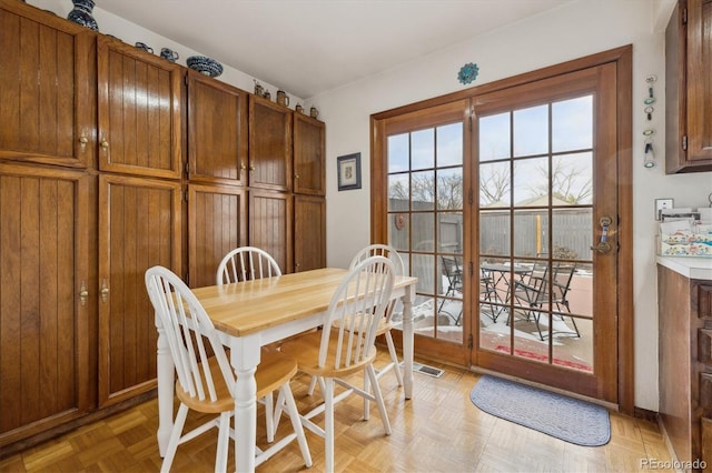 dining room with visible vents