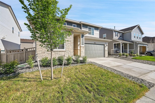 4644 Hatcher Dr, Brighton, CO 80601 - view of front facade featuring stone siding, concrete driveway, and a garage