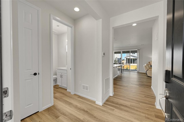 4644 Hatcher Dr, Brighton, CO 80601 - hallway with light wood-type flooring and recessed lighting