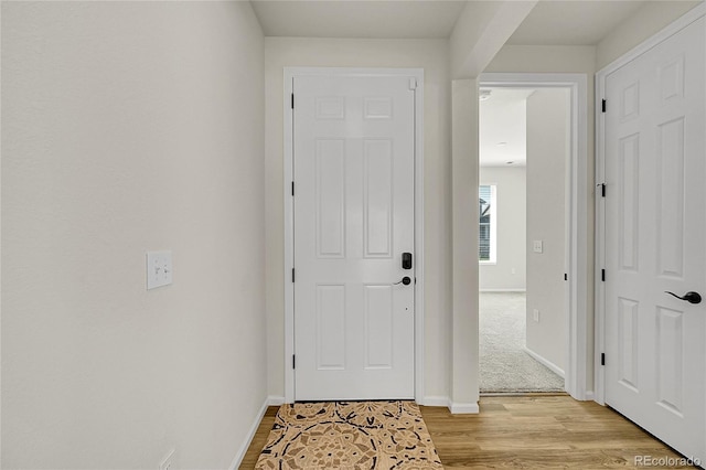 4644 Hatcher Dr, Brighton, CO 80601 - foyer featuring light wood-style flooring and baseboards