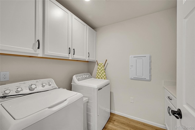 4644 Hatcher Dr, Brighton, CO 80601 - laundry area with separate washer and dryer, cabinet space, and light wood-type flooring