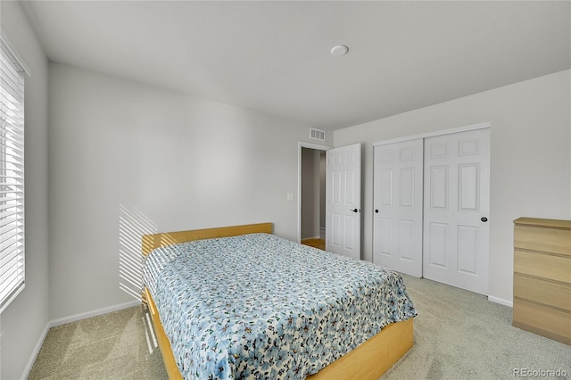 4644 Hatcher Dr, Brighton, CO 80601 - bedroom with light carpet, multiple windows, and a closet
