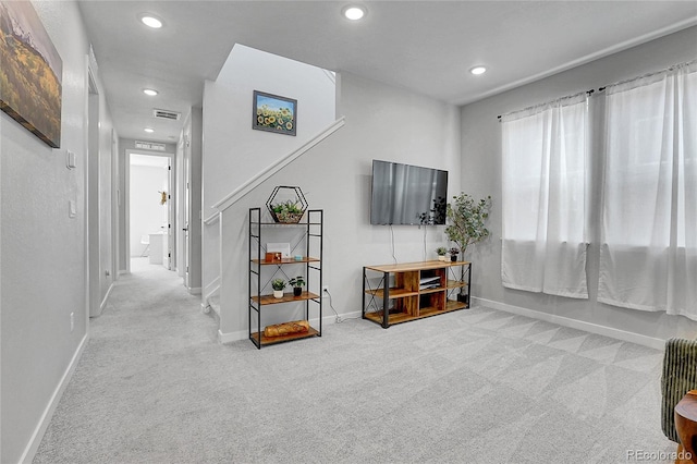 8728 Hotchkiss St, Littleton, CO 80125 - carpeted living room with baseboards and recessed lighting