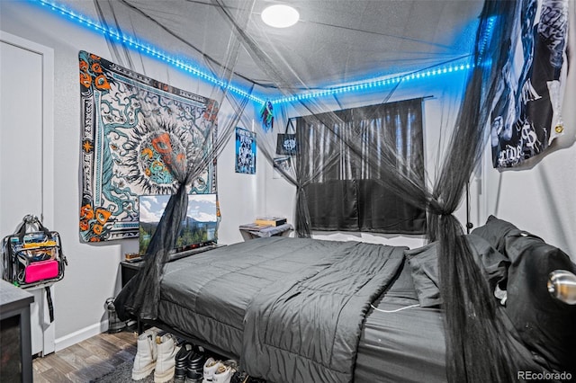 bedroom featuring hardwood / wood-style flooring