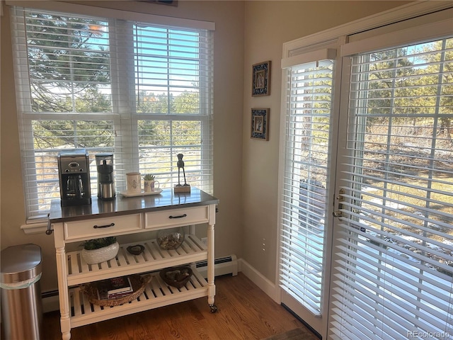 details with wood finished floors and baseboards