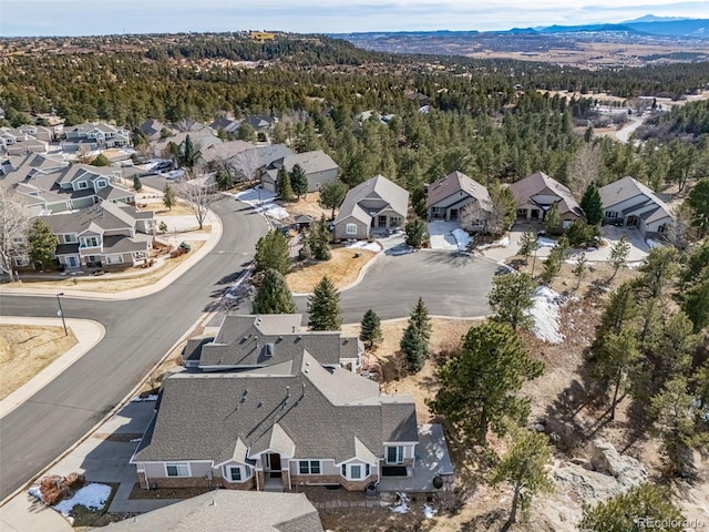 birds eye view of property with a residential view and a mountain view