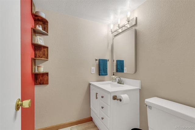 387 Upham St, Lakewood, CO 80226 - bathroom with toilet and vanity