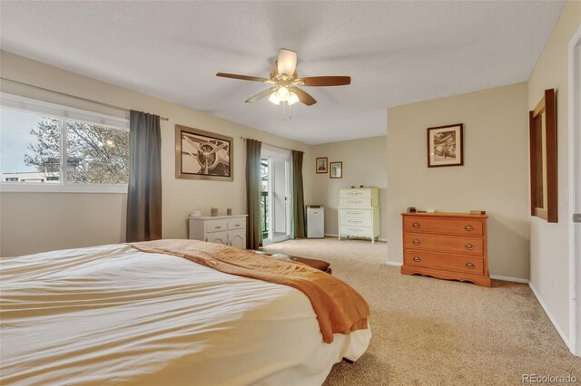 387 Upham St, Lakewood, CO 80226 - bedroom featuring light colored carpet, a ceiling fan, and baseboards