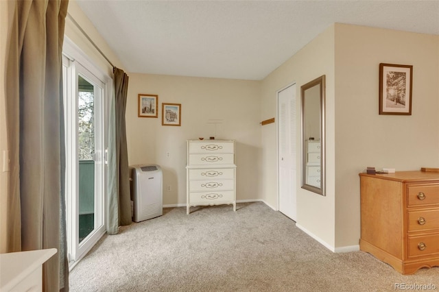387 Upham St, Lakewood, CO 80226 - bedroom with light colored carpet and baseboards