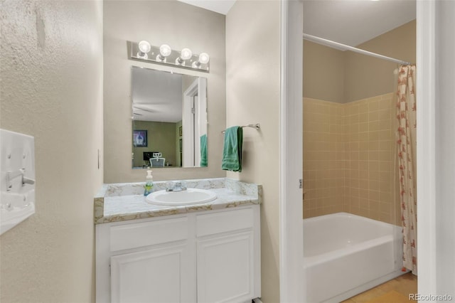 387 Upham St, Lakewood, CO 80226 - full bathroom featuring vanity and shower / bath combo with shower curtain