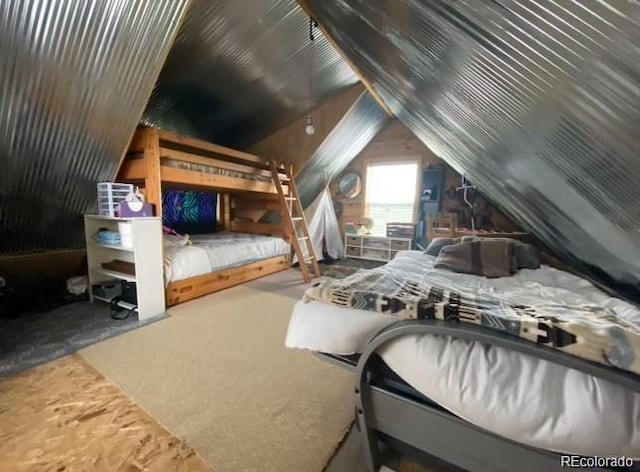 bedroom with lofted ceiling