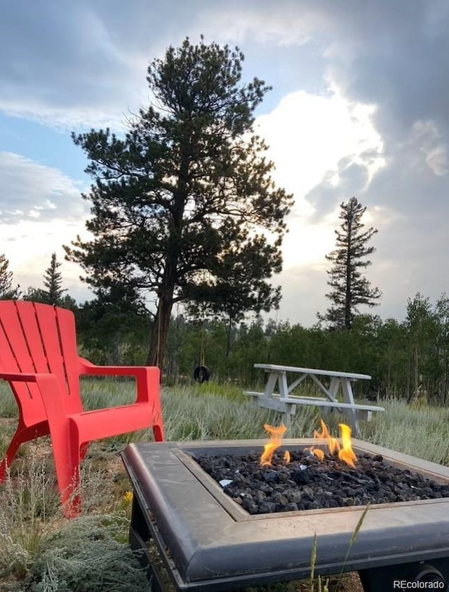 exterior space featuring a fire pit