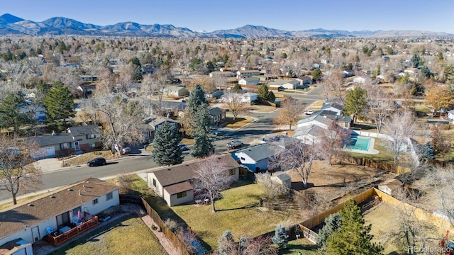 birds eye view of property with a mountain view