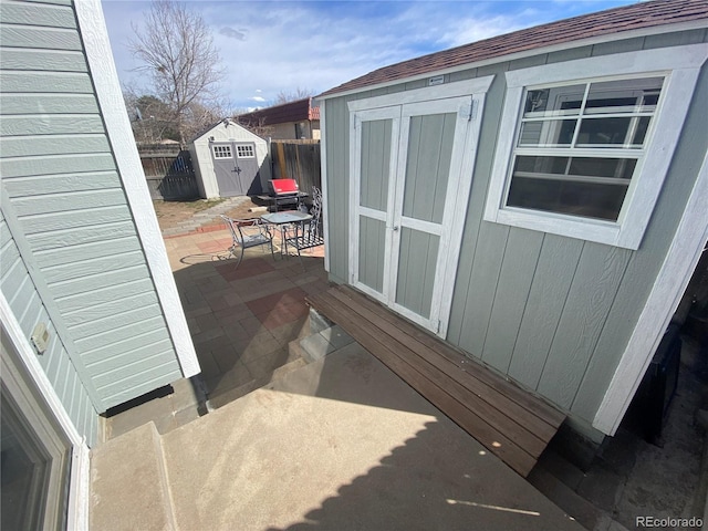 exterior space with fence and a patio