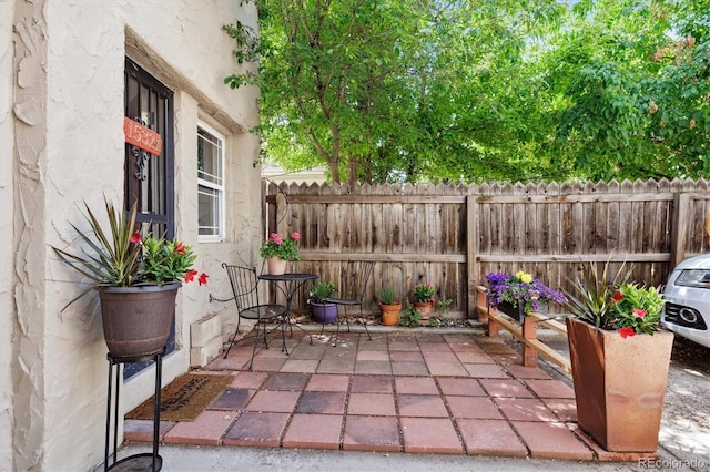 view of patio with fence