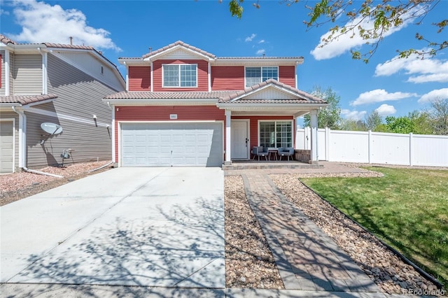 5552 Odessa St, Denver, CO 80249 - traditional home featuring covered porch, concrete driveway, and an attached garage
