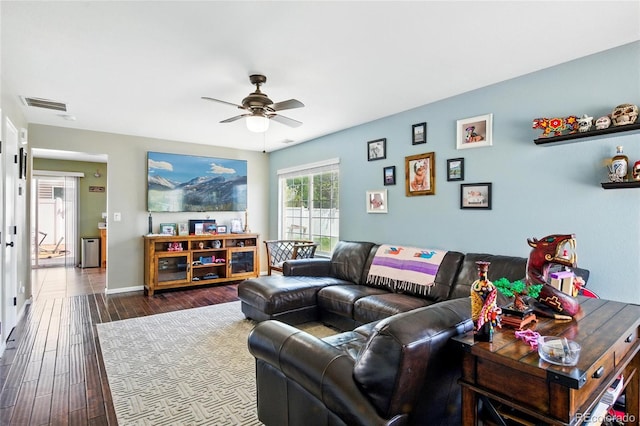 5552 Odessa St, Denver, CO 80249 - living area with a ceiling fan, dark wood-style floors, and baseboards