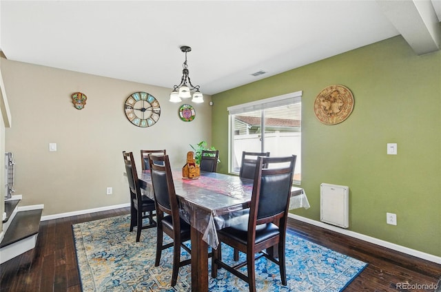 5552 Odessa St, Denver, CO 80249 - dining room featuring baseboards and wood-type flooring