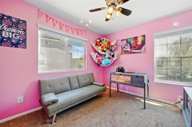 5552 Odessa St, Denver, CO 80249 - game room featuring carpet flooring, a ceiling fan, and baseboards