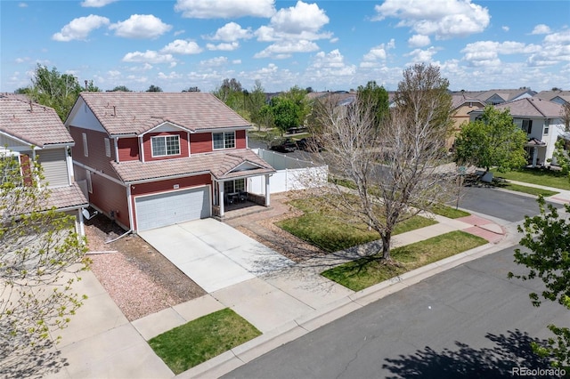 5552 Odessa St, Denver, CO 80249 - traditional-style home with concrete driveway, a garage, a tiled roof, and a residential view