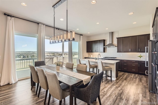 14440 Hop Clover Trl, Parker, CO 80134 - dining room with wood finished floors and recessed lighting