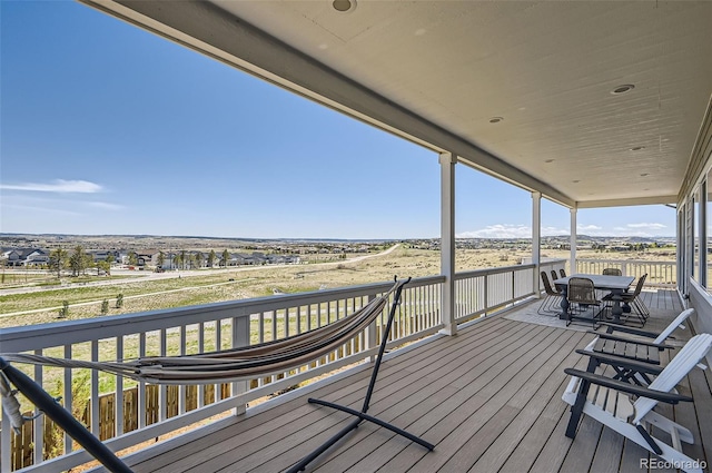 14440 Hop Clover Trl, Parker, CO 80134 - wooden deck featuring outdoor dining area