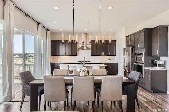 14440 Hop Clover Trl, Parker, CO 80134 - dining room with wood finished floors and recessed lighting