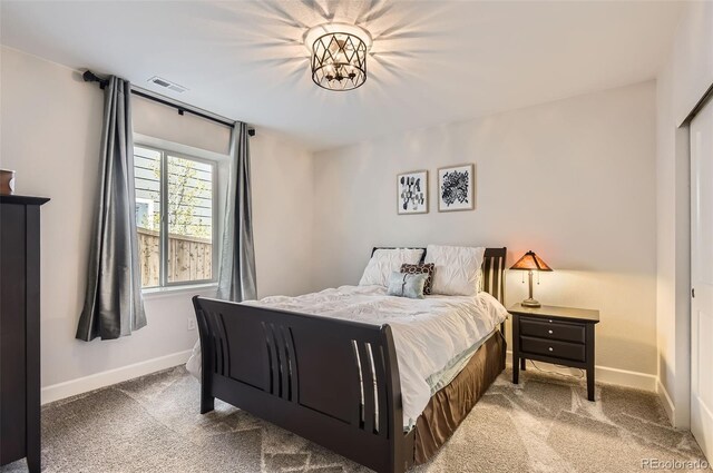 14440 Hop Clover Trl, Parker, CO 80134 - carpeted bedroom featuring baseboards