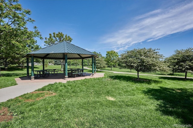 surrounding community featuring a lawn and a gazebo