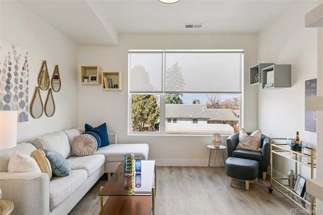 5385 W 14th Ave, Lakewood, CO 80214 - living room featuring wood finished floors and baseboards