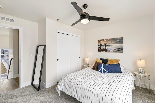 5385 W 14th Ave, Lakewood, CO 80214 - carpeted bedroom with a closet, baseboards, and a ceiling fan