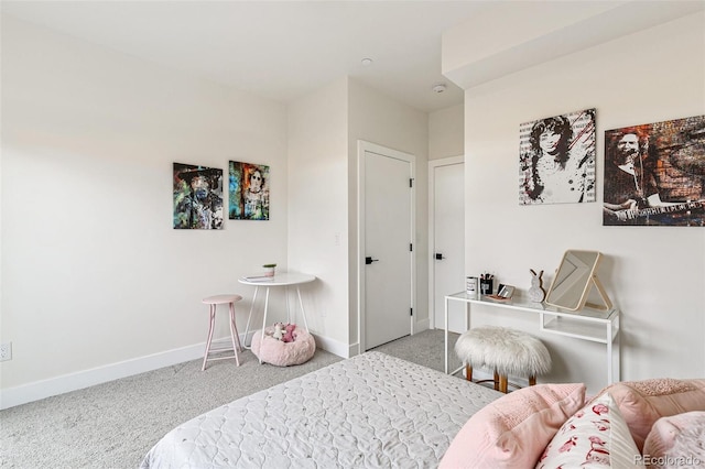 5385 W 14th Ave, Lakewood, CO 80214 - bedroom with carpet flooring and baseboards
