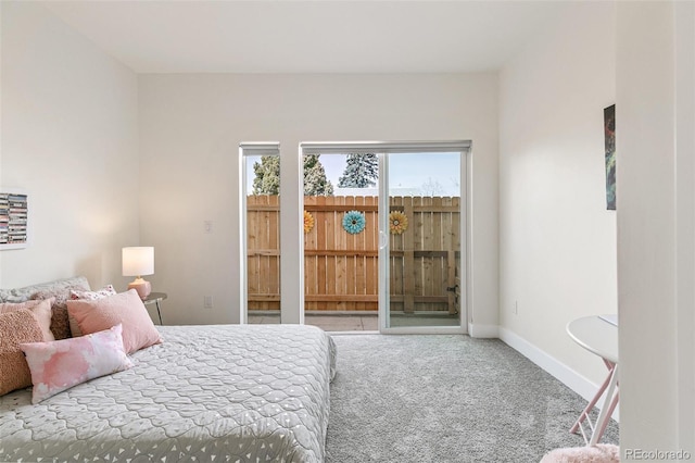 5385 W 14th Ave, Lakewood, CO 80214 - bedroom featuring access to outside, carpet, and baseboards