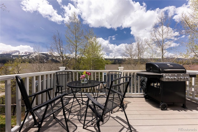 218 Highland Ter, Breckenridge, CO 80424 - wooden deck with a grill and a mountain view