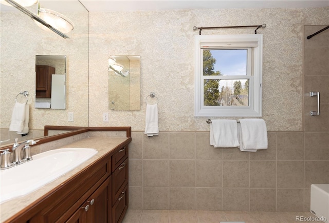 218 Highland Ter, Breckenridge, CO 80424 - bathroom featuring vanity, a shower, wallpapered walls, wainscoting, and a bath