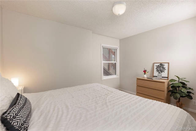 218 Highland Ter, Breckenridge, CO 80424 - bedroom with baseboards and a textured ceiling