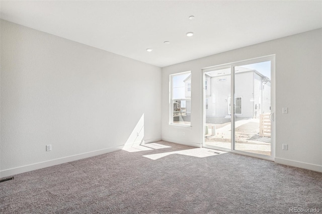 9314 Biscay St, Commerce City, CO 80022 - carpeted spare room featuring baseboards