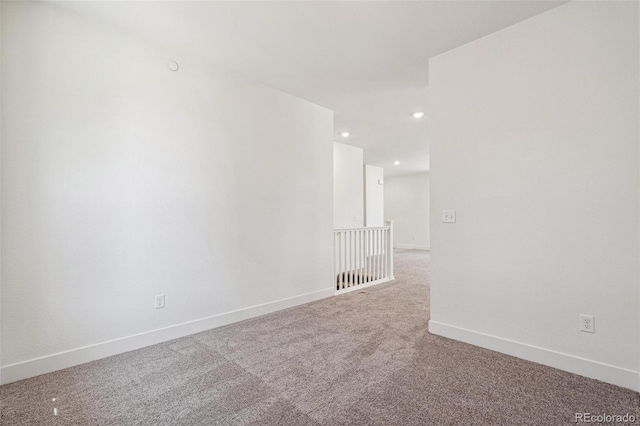 9314 Biscay St, Commerce City, CO 80022 - carpeted spare room featuring baseboards and recessed lighting