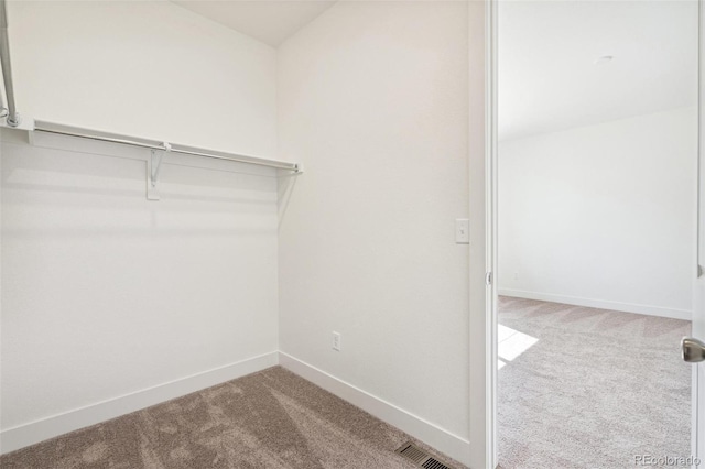 9314 Biscay St, Commerce City, CO 80022 - spacious closet featuring carpet and visible vents