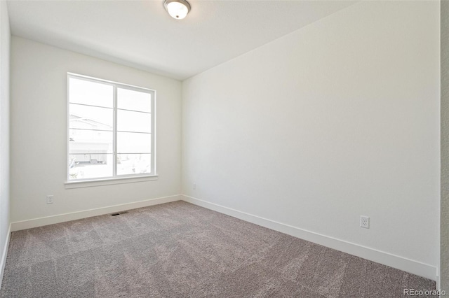 9314 Biscay St, Commerce City, CO 80022 - carpeted spare room featuring baseboards and visible vents