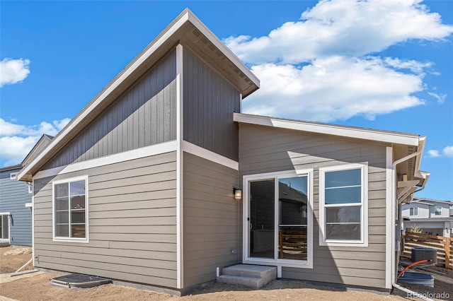9314 Biscay St, Commerce City, CO 80022 - rear view of house with cooling unit
