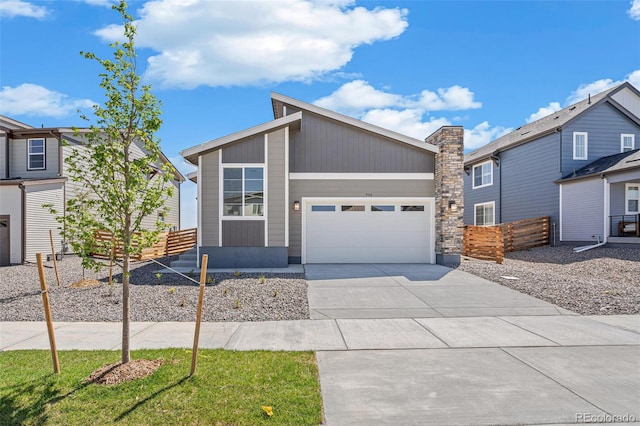 9314 Biscay St, Commerce City, CO 80022 - mid-century modern home featuring concrete driveway, an attached garage, and fence