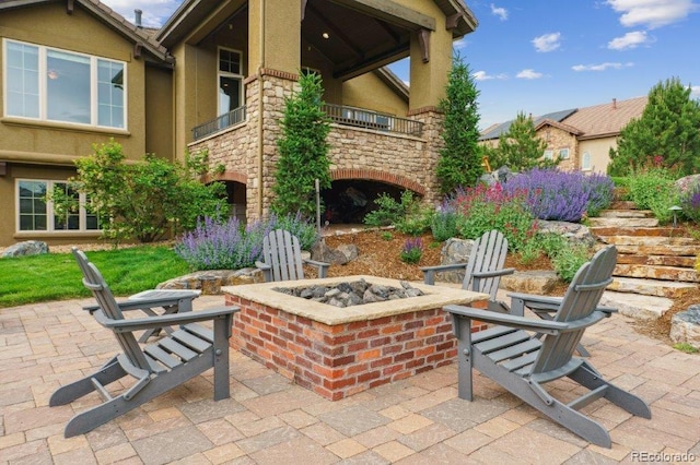 4651 Sonado Pl, Parker, CO 80134 - patio / terrace featuring an outdoor fire pit and a patio area