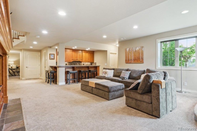 4651 Sonado Pl, Parker, CO 80134 - living room with light colored carpet, recessed lighting, and bar area