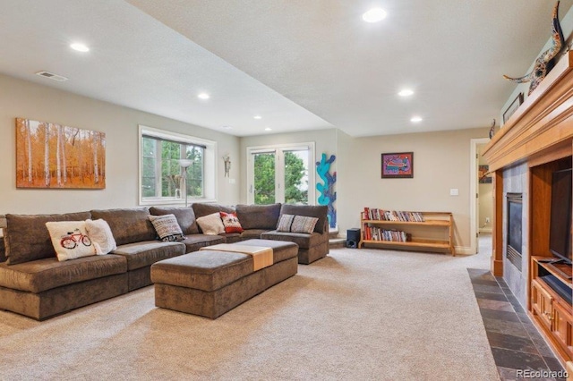 4651 Sonado Pl, Parker, CO 80134 - living area with recessed lighting, dark colored carpet, and a fireplace with flush hearth