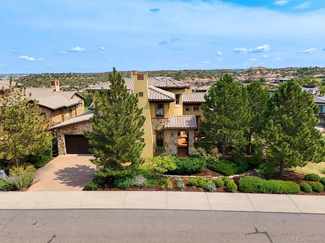 view of front of property with a garage