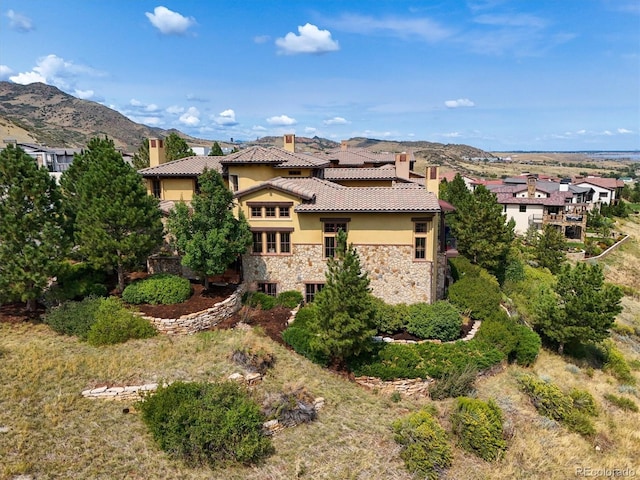 exterior space featuring a mountain view