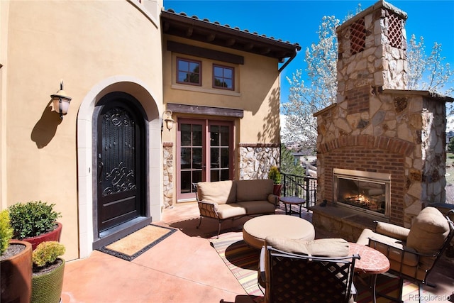 doorway to property featuring a patio